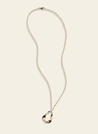 Lumoava Studio Going Solo riipus, keltakullattua pronssia